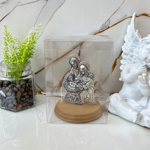 adorno sagrada familia relieve plateado con vela aromatica base madera